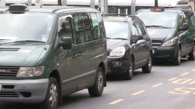 Taxi drivers queuing