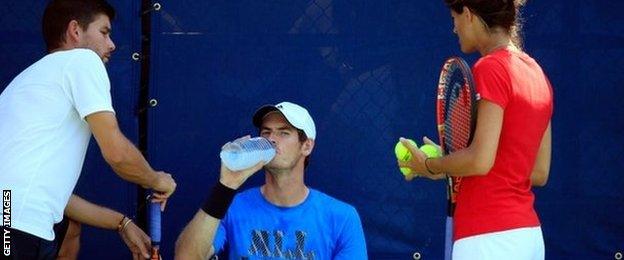 Andy Murray (centre) with coaching team of Amelie Mauresmo (right) and Danny Vallverdu