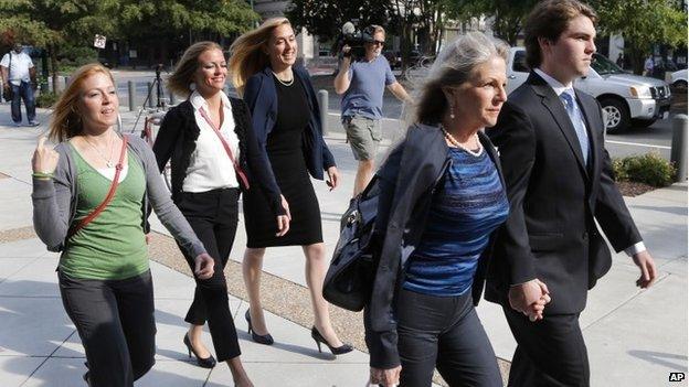 Former Virginia first lady Maureen McDonnell, second from right, holds hands with her son Bobby McDonnell, right, as they arrive at federal court followed by daughter Cailin Young, left, Rachel McDonnell, second form right, and attorney Heather Martin, center, in Richmond, Virgina 28 August 2014