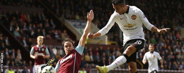 Robin van Persie and Burnley defender Michael Duff