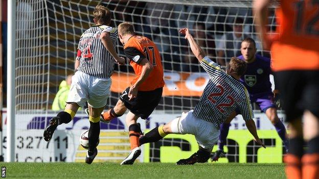 Chris Erskine scores for Dundee United against St Mirren