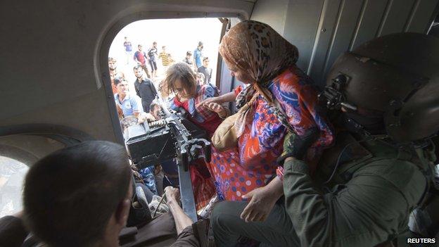 Women and children evacuated by Iraqi forces from Amerli 29 August 2014