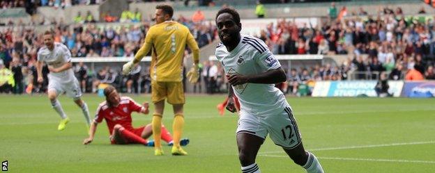 Nathan Dyer wheels away after putting Swansea ahead against West Bromwich Albion