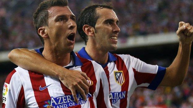 Mario Mandzukic and Diego Godin