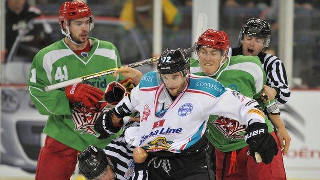 Darryl Lloyd tangles with Andew Hotham in Saturday's Odyssey Arena friendly