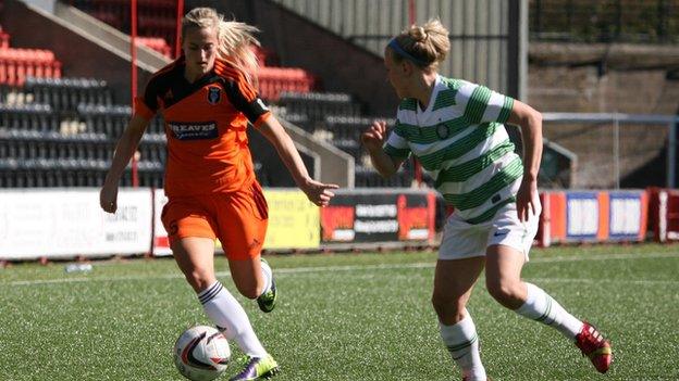 Glasgow City's Emma Black takes on Kylla Sjoman of celtic