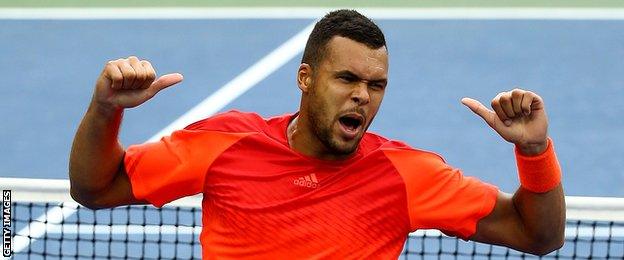 Jo-Wilfred Tsonga celebrates getting through to the fourth round of the US Open