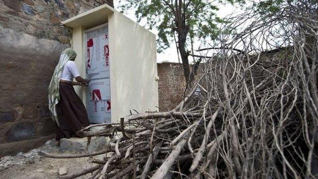 Indian village resident Geeta uses a toilet constructed by the Sulabh International NGO in the Hirmathala village of Mewat district in the state of Haryana.