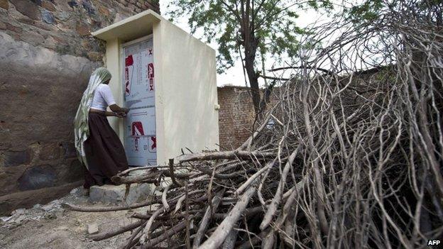 Indian village resident Geeta uses a toilet constructed by the Sulabh International NGO in the Hirmathala village of Mewat district in the state of Haryana.