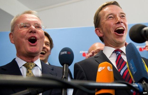 AfD leader Bernd Lucke (R) with Hans-Olaf Henkel (L) speak to reporters in Berlin (31 August)