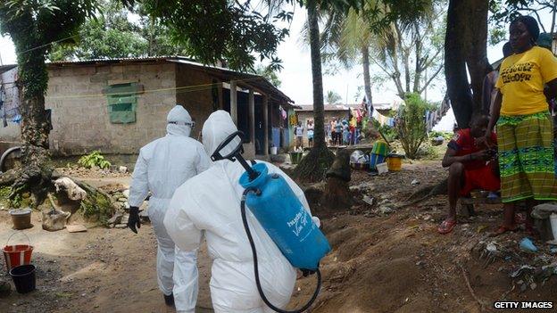 Healthcare workers visit a village