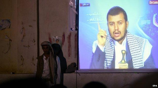 Houthi supporters listen to a speech by Abdul Malik al-Houthi at a sit-in in Sanaa (26 August 2014)