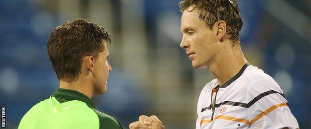 Dominic Thiem shakes hands with Tomas Berdych