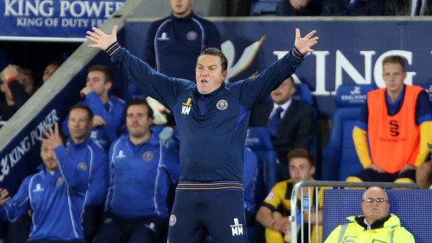 Shrewsbury Town manager Micky Mellon celebrates his side's League Cup win at Leicester