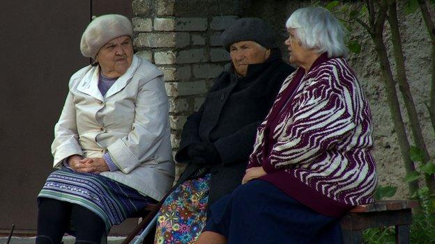 Yevgenia and two friends sitting on a bench near the Narva River - 2 September 2014