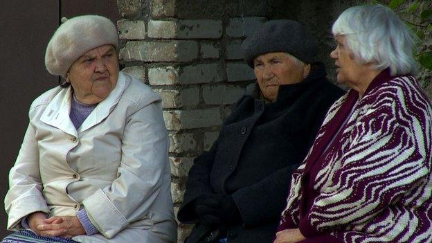 Yevgenia and two friends sitting on a bench near the Narva River - 2 September 2014