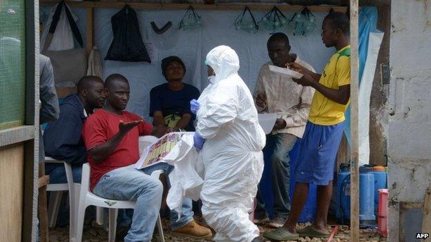 A health care worker of the John Fitzgerald Kennedy hospital of Monrovia