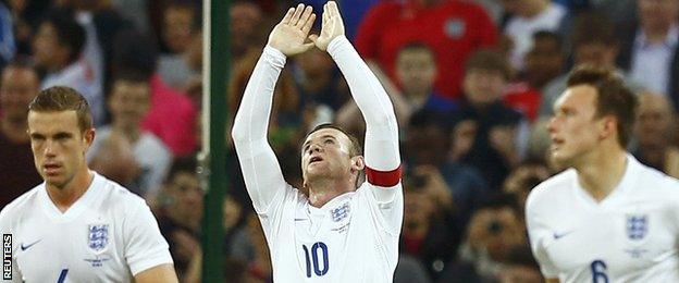 England captain Wayne Rooney (centre)