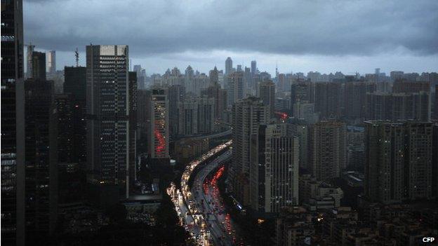 Dark clouds cover the city's skyline on 22 May 2014 in Guangzhou, Guangdong Province of China.