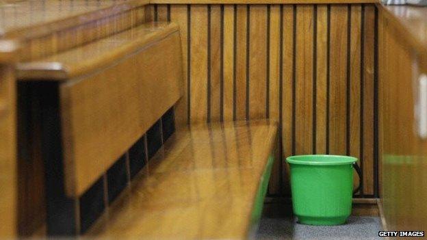 An empty bucket is seen where Oscar Pistorius normally sits in the Pretoria High Court on 8 April 2014, in Pretoria, South Africa