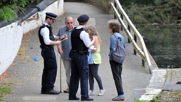 Police speak to members of the public