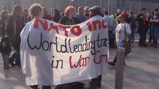 Protesters begin to gather in Cardiff