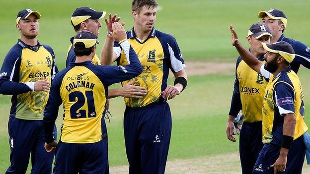 The Bears celebrate another wicket