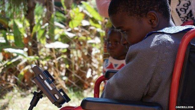 Disabled child in Malawi using app