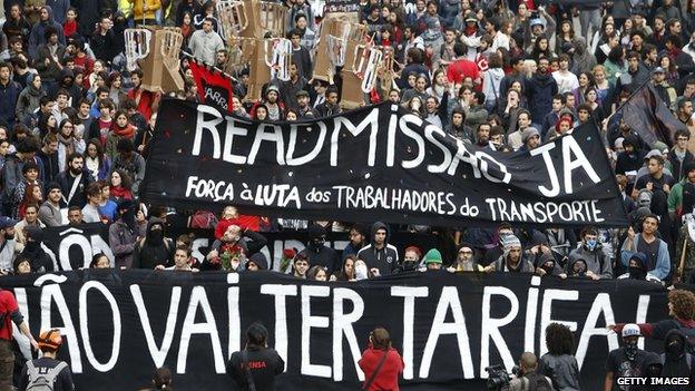 Protesters march in Sao Paulo, Brazil, on June 19, 2014, to mark the first demontsrations against the rise of public bus and subway fare a year earlier