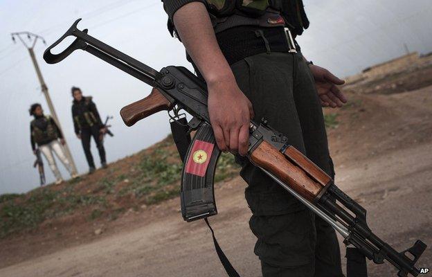 A Kurdish female fighter in northern Syria 3 March 2014