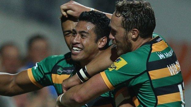 George Pisi and teammates celebrate