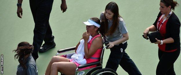 Peng Shuai had to be taken off the court in a wheelchair