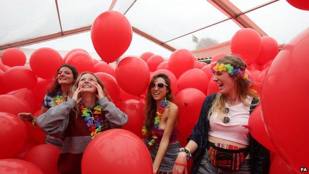 Festival goers experiencing artist Martin Creed"s immersive installation "Work No. 204