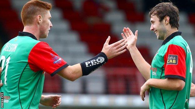 Kym Nelson and Fra McCaffrey celebrate Glentoran's early goal against Coleraine