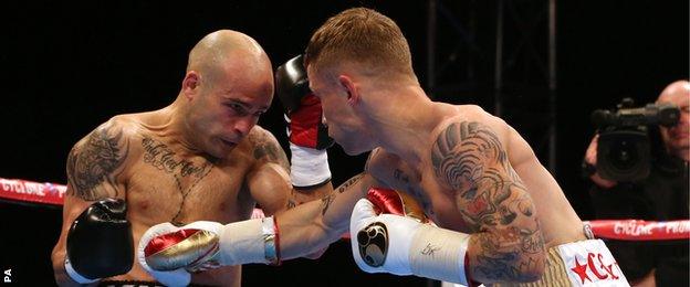 Carl Frampton (right) in action against Kiko Martinez