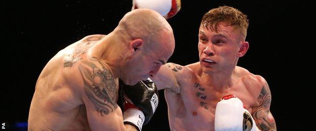 Carl Frampton (left) in action against Kiko Martinez