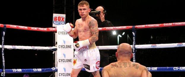 Carl Frampton reacts after knocking down Kiko Martinez