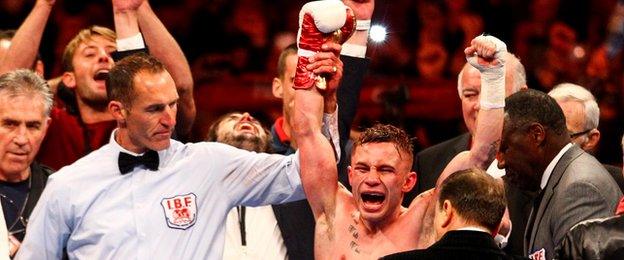 Carl Frampton celebrates after being announced as the new world IBF super-bantamweight champion