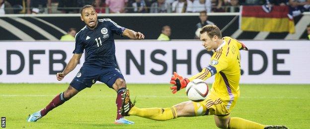 Ikechi Anya scores for Scotland against Germany