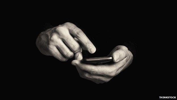 Man holding smartphone