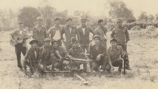 The author, Nguyen Thanh Nhan, (kneeling first from left) at a Vietnamese military base inside Cambodia, 1985