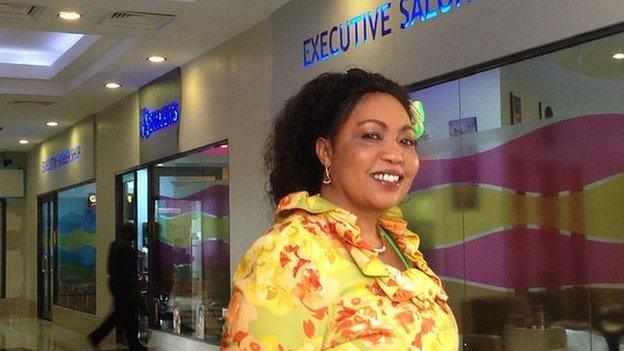 Terry Mungai outside her salon