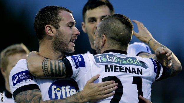 Dundalk celebrate Darren Meenan's opening goal against Derry City