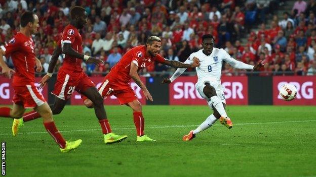 England's Danny Welbeck scores against Switzerland