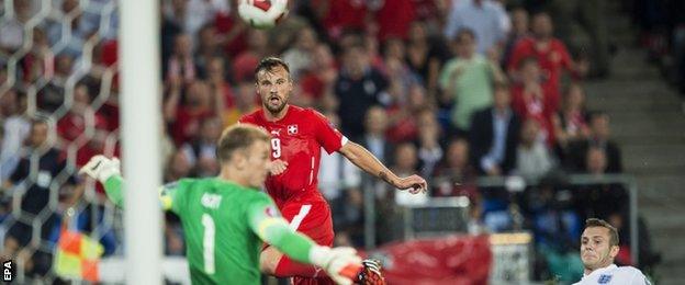 England keeper Joe Hart saves from Haris Seferovic