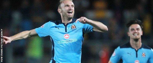 Luke Chadwick celebrates scoring against Newport County