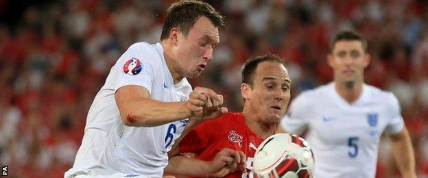 England defender Phil Jones (left)