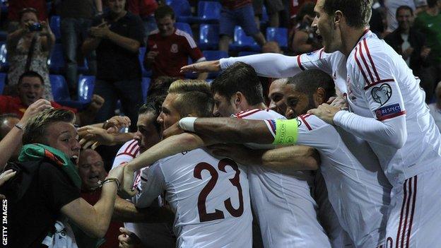 Wales celebrate the first goal