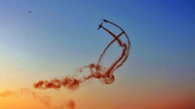 Planes with smoke trails