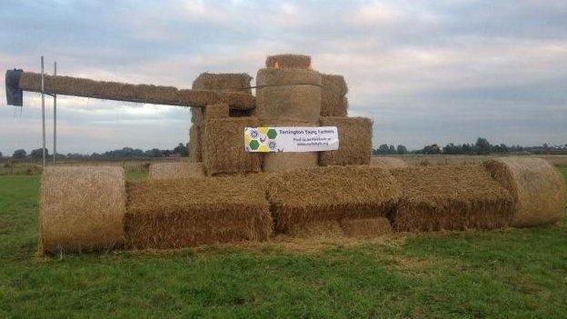 A combine harvester made out of hay bales